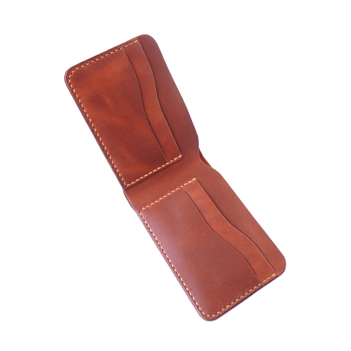 The Wave Bifold full grain leather bifold wallet with 4 card slots and currency pocket tan