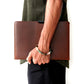 Slider handcrafted full-grain leather iPad sleeve in rich brown leather with a slim minimalist design.