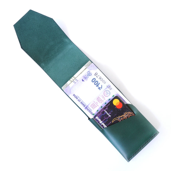 Slim leather wallet holding cash and cards